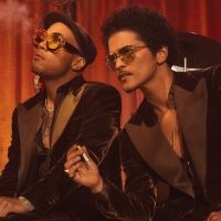 Silk Sonic Releases New 'Smoking Out the Window' Single