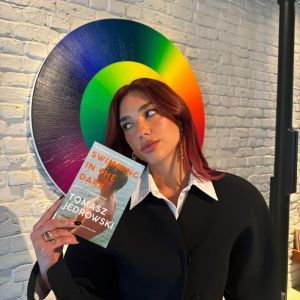 Dua Lipa's SERVICE95 Book Club Reveals 'Swimming In The Dark' by Tomasz Jedrowski as…