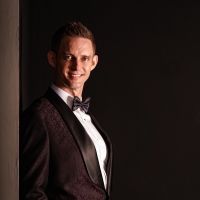 Interview: John Riley Talks Law, Lyrics, and His New Musical A GIRL I KNOW