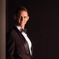 Interview: John Riley Talks Law, Lyrics, and His New Musical A GIRL I KNOW
