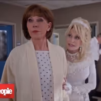 VIDEO: Christine Baranski Says Dolly Parton Plays a 'Sexy Foxy Angel' in CHRISTMAS… Video