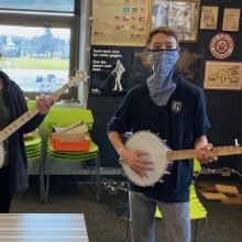 Joe Mullins and Adam McIntosh Present Instruments to Ohio School