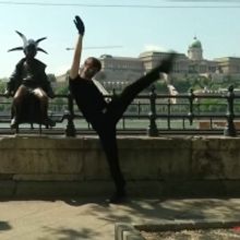 Dancer Performs to Melody Modeling the Structure of the Virus to Mark International D