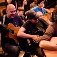 Guitar Mash Brings “Urban Campfire: Queens” to Flushing Town Hall