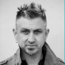 Interview: How KIMBERLY AKIMBO Orchestrator John Clancy Went From Rock Drummer To Bro