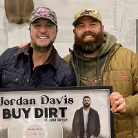 Jordan Davis and Luke Bryan Celebrate Platinum-Certified #1 Single 'Buy Dirt'