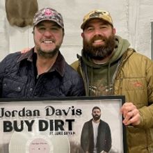 Jordan Davis and Luke Bryan Celebrate Platinum-Certified #1 Single 'Buy Dirt'