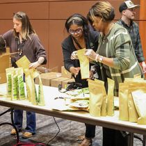 Raleigh Convention And Performing Arts Complex Hosts Soup Packing Event To Feed Local Residents