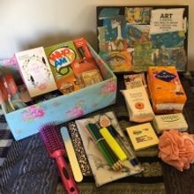 Theatr Clwyd and Flintshire County Council Collaborate to Bring Boxes of Joy to Child