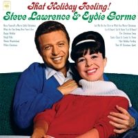 Album Review: Out Of The Past Comes A Legendary Duo Singing Songs For Christmas, As…