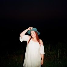 Watch: The Belle Curves Pay Homage To Their Hometown With 'Rosé Drive-Thru' Music Vi