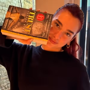 Dua Lipa's SERVICE95 Book Club Sets 'Trust' by Hernan Diaz as March Read