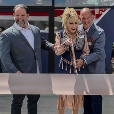 Photos: Dolly Parton Surprises Visitors at Grand Opening of New Travel Stop