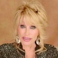 Dolly Parton Presents Dan Rather with Peabody Career Achievement Award