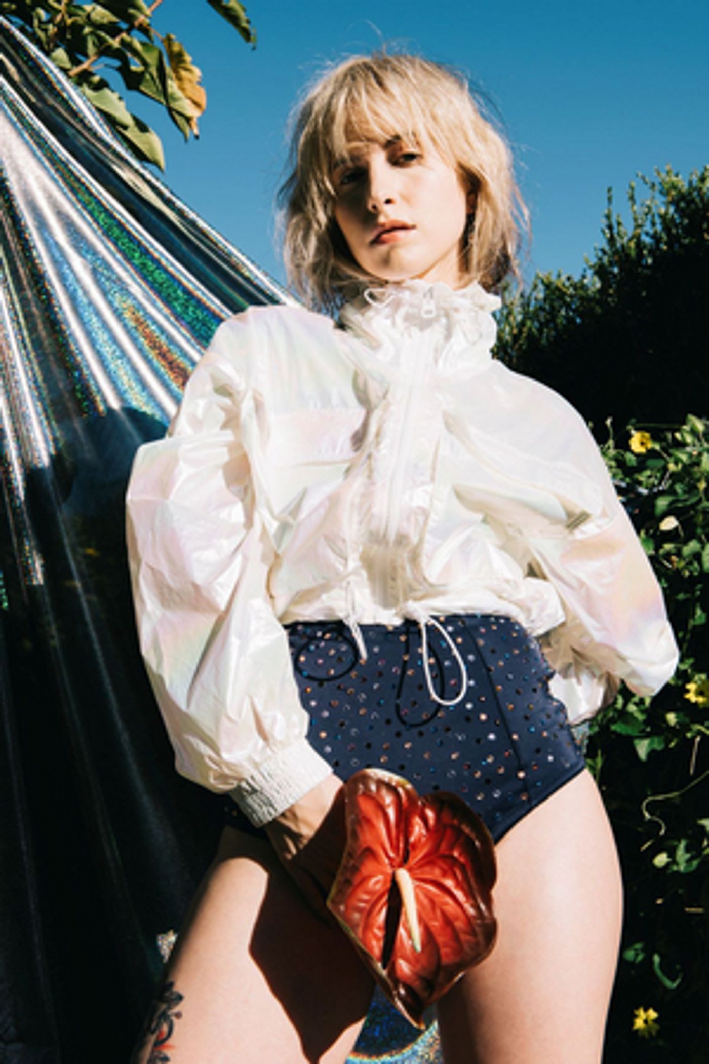 Hayley Williams Releases 'Watch Me While I Bloom' Lyric Video Hayley Williams Releases 'Watch Me While I Bloom' Lyric Video Image