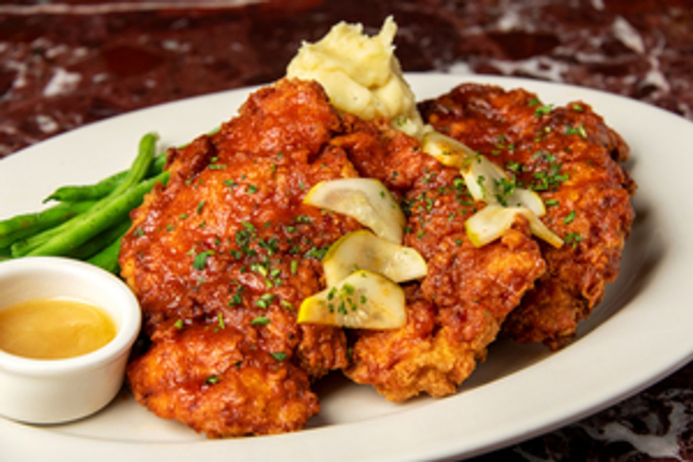 Cooking Time: GRAND LUX CAFE Go-to Recipe for Nashville Hot Chicken  Image