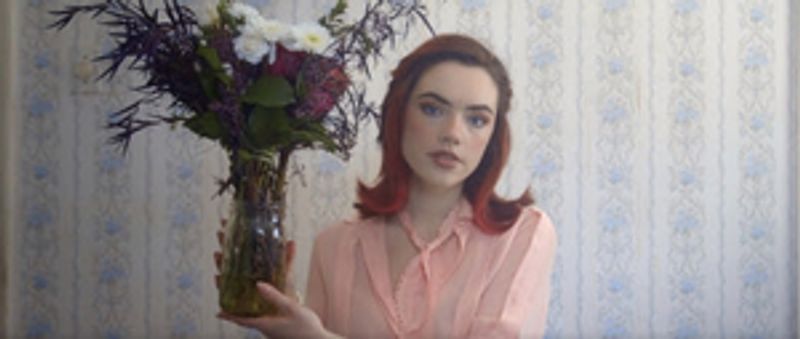 Genevieve Stokes Shares Video for 'Running Away' Image