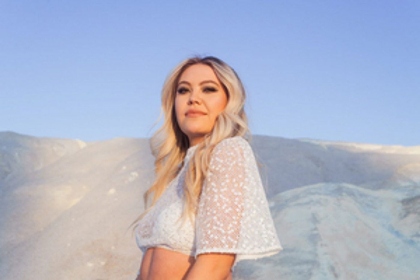 Bri Fletcher Gets Caught In Relationship Limbo In New Single 'Love Me Back'  Image