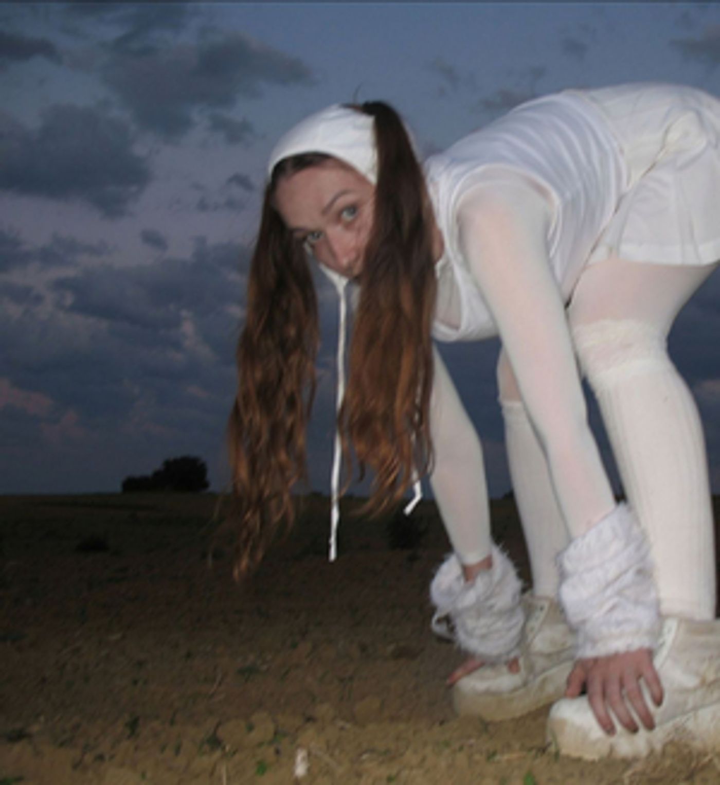 E L L E Returns With New Single 'Deepfake'  Image