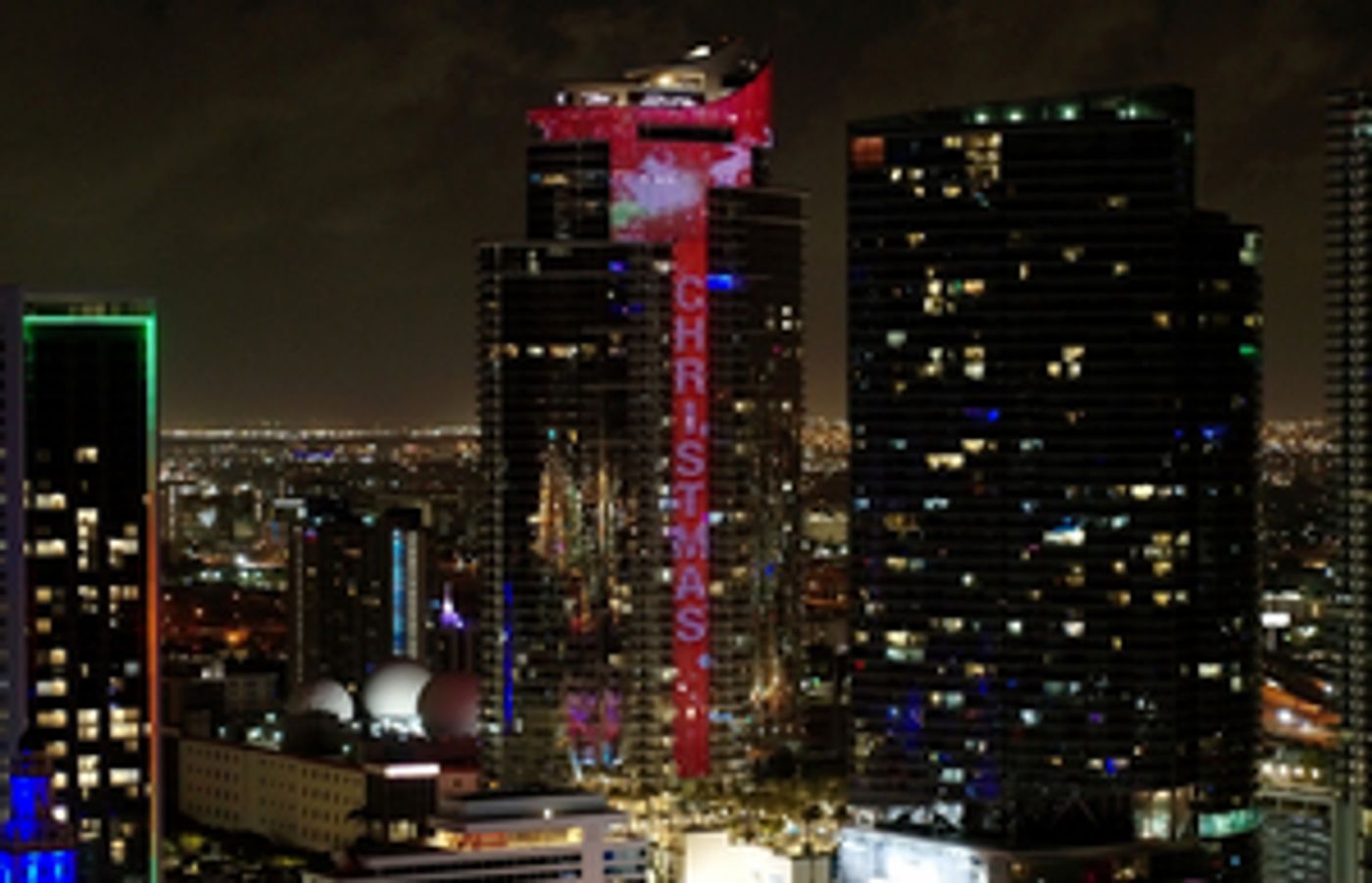 World's Tallest Digital 'Merry Christmas' Candy Cane and Santa's 'Magic City' Skyline Sleigh Fly-Over Paramount Miami Worldcenter  Image