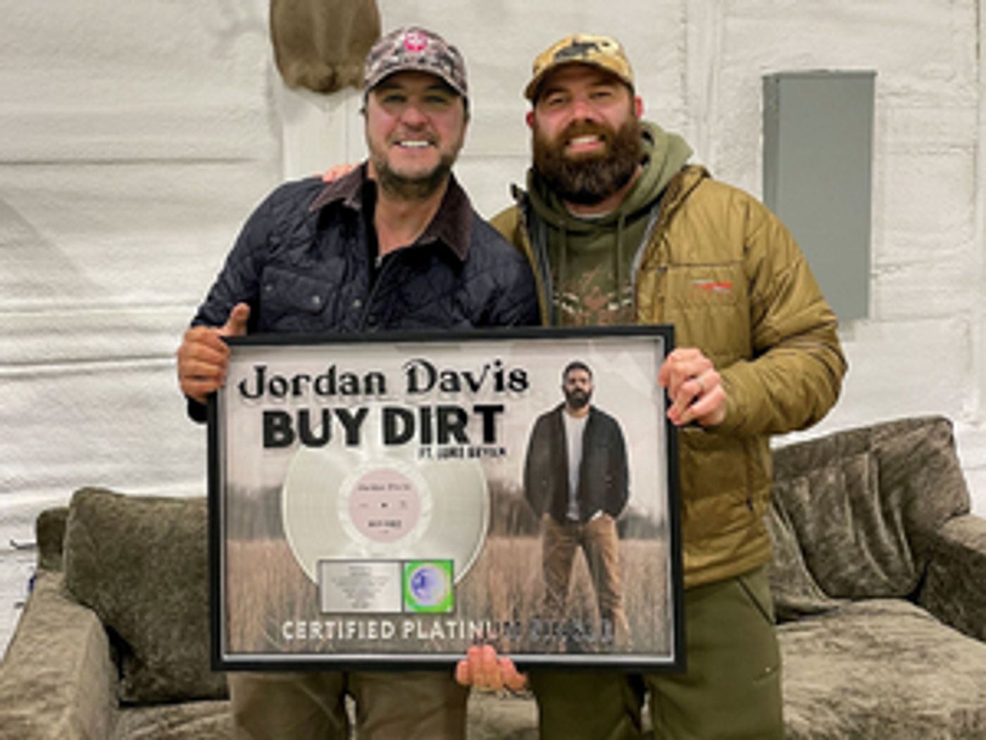 Jordan Davis and Luke Bryan Celebrate Platinum-Certified #1 Single 'Buy Dirt' Jordan Davis and Luke Bryan Celebrate Platinum-Certified #1 Single 'Buy Dirt' Image