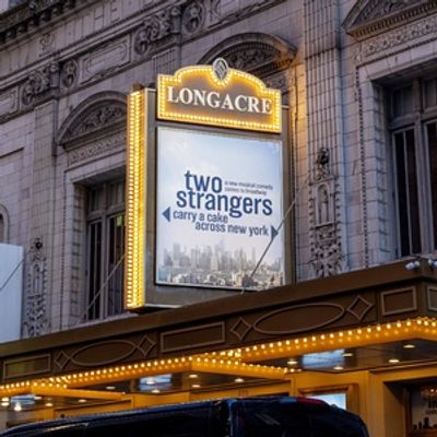 Up on the Marquee: TWO STRANGERS (CARRY A CAKE ACROSS NEW YORK)