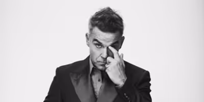 Robbie Williams Sets Australia and New Zealand Dates for BRITPOP World Tour Photo