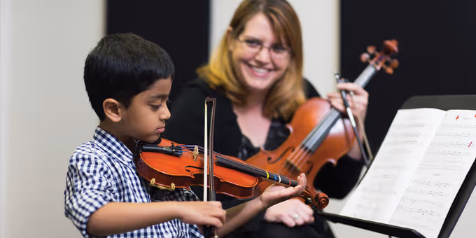 American Music Institute to Offer Violin Fiddling Lessons for St. Patrick's Day Photos