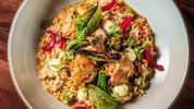 BERIMBAU BRAZILIAN TABLE 36th St. serves Brazil’s Galinhada Photo