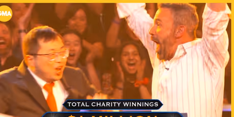 Ben Affleck and Jamie Ding Win Big on WHO WANTS TO BE A MILLIONAIRE for Charity Photo