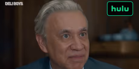 Fred Armisen and Poorna Jagannathan Hit the Couch in New DELI BOYS Season 2 Clip Photo