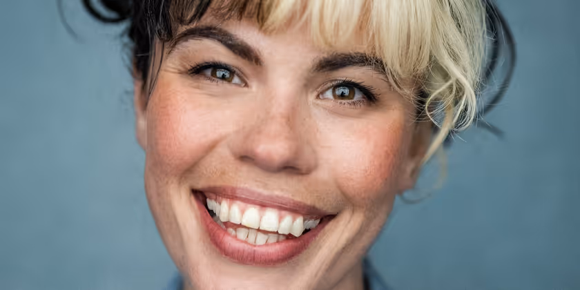 Interview: 'It's a bit of a gift!' Emily Benjamin on AVENUE Q Photo