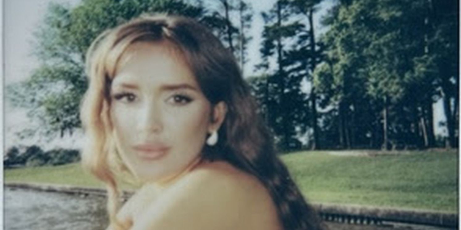 Laci Kaye Booth Releases Full-Length Debut 'The Loneliest Girl In The World'  Image