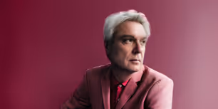 Listen: David Byrne Unveils New Single 'She Explains Things To Me'