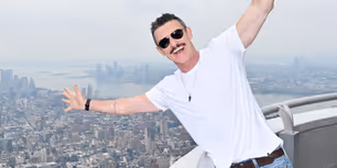 Photos: THE ROCKY HORROR SHOW Star Luke Evans Lights a Rainbow Empire State Building for NYC Pride