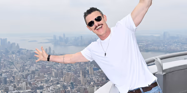 Photos: THE ROCKY HORROR SHOW Star Luke Evans Lights a Rainbow Empire State Building for NYC Pride Photo