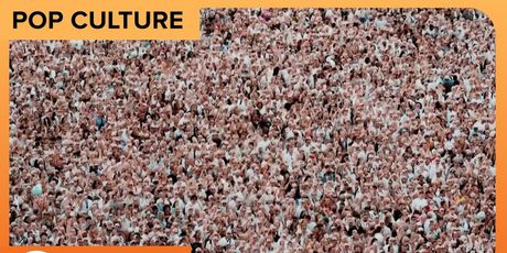 Pitbull Sets Guinness World Record for Largest Gathering of People in Bald Caps Photo