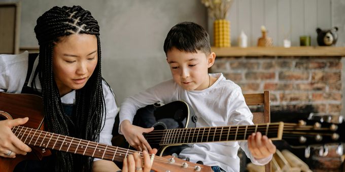 American Music Institute to Offer 25% Off Guitar Lessons Photos