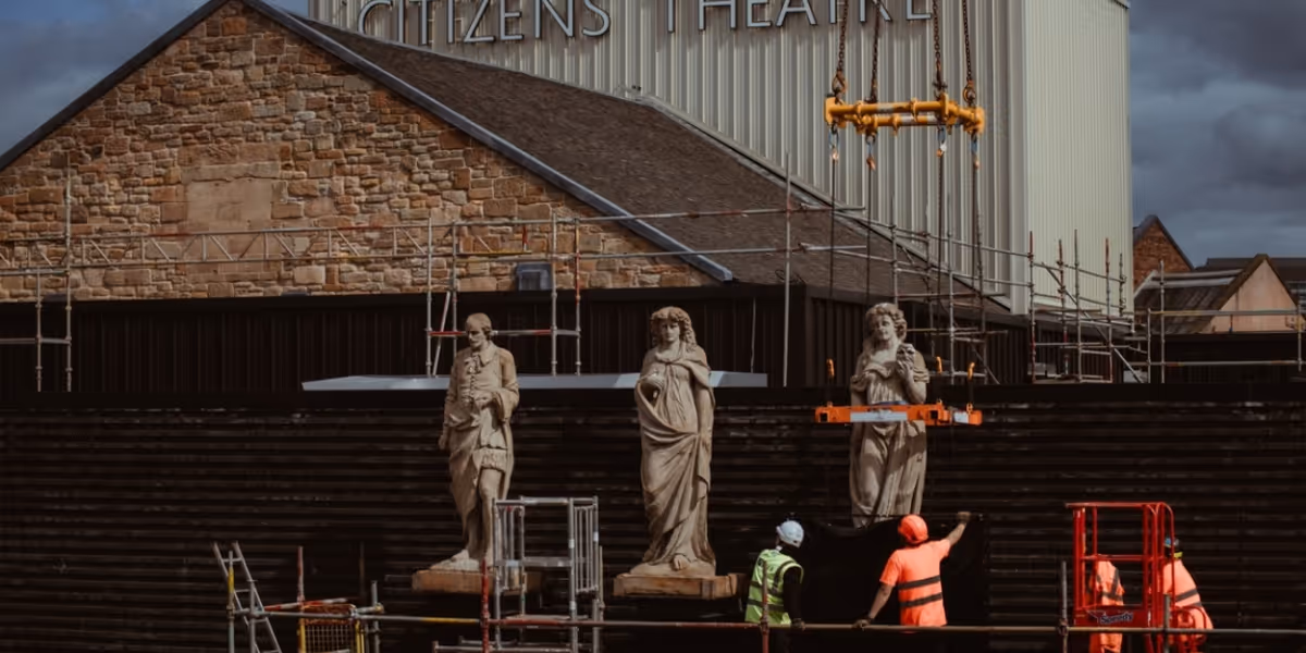 Six Statues Dramatically Returned To The Roof of The Citizens Theatre