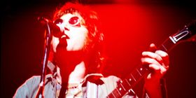 John Lennon & Yoko Ono Perform 'Instant Karma!' in Concert Clip