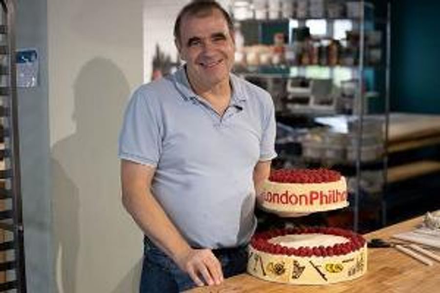 Great British Bake Off 2021 Semi-Finalist Jürgen Presents London Philharmonic Orchestra with 90th Birthday Cake Image