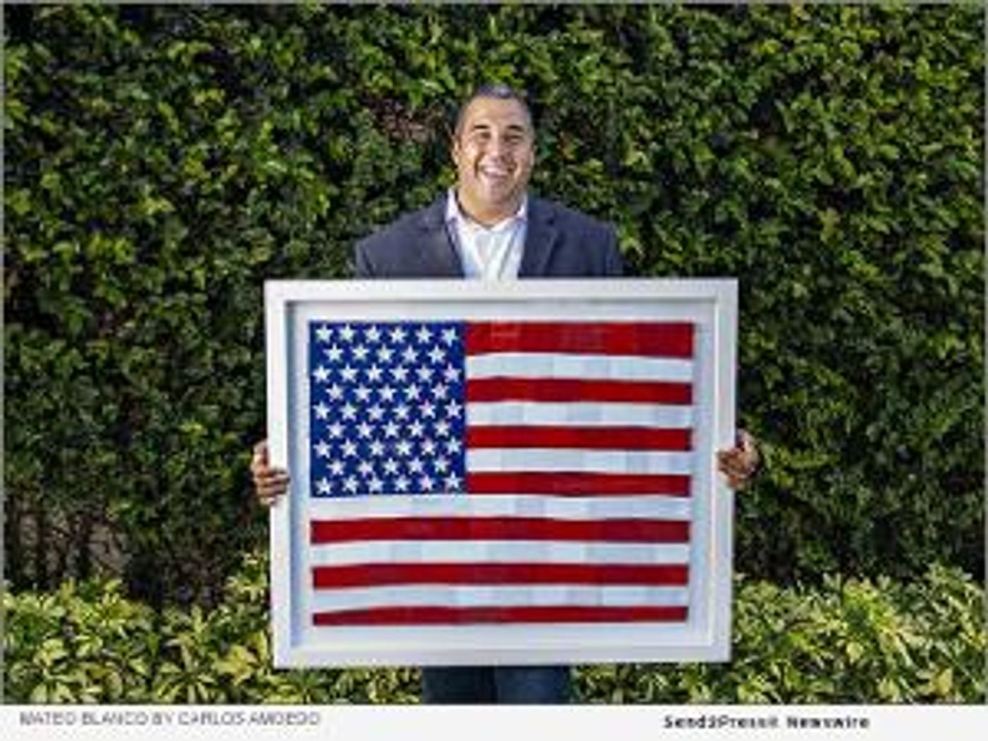 American Artist Mateo Blanco Creates A Portrayal Of The American Flag Made From His Clothing  Image