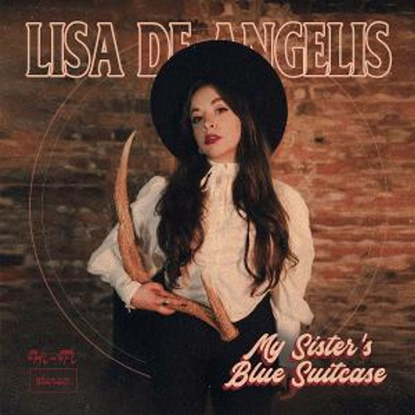 Lisa De Angelis Releases Single and Music Video for 'My Sisters Blue Suitcase'  Image