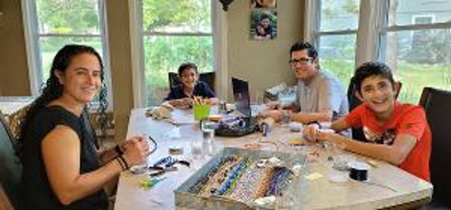 Local Boy Making Mask Aids To Support Jewish Family Services Food Pantry Image