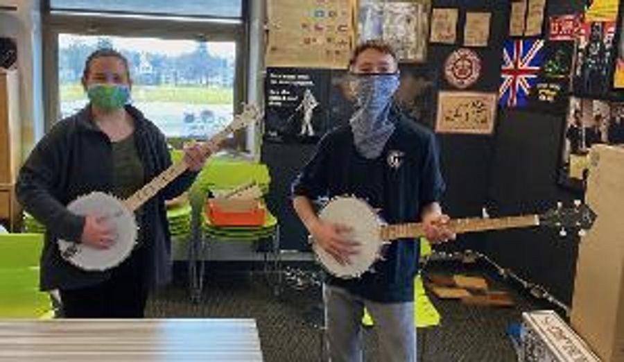 Joe Mullins and Adam McIntosh Present Instruments to Ohio School Image