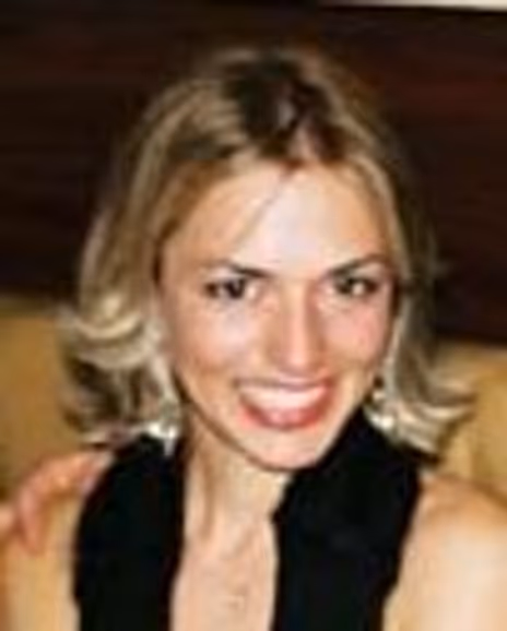 Andrea Elmer Faustino Headshot