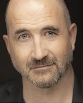 Travis Mitchell Headshot