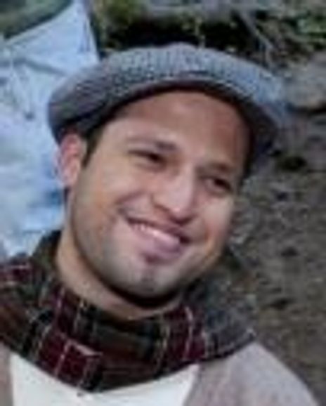 Carlos Alexis Cruz Headshot