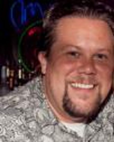 Justin "Squigs" Robertson Headshot