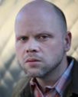 Adam Smith, Jr. Headshot